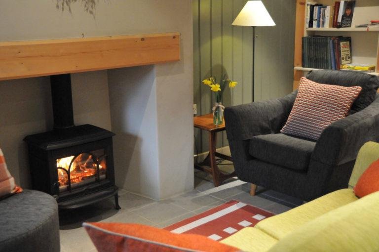 Cosy up by the fire in Ty Twt